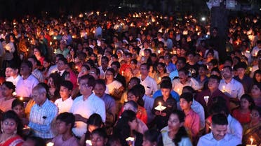 File photo of Indian Catholic Christians attending a midnight Easter vigil mass. (AFP) 