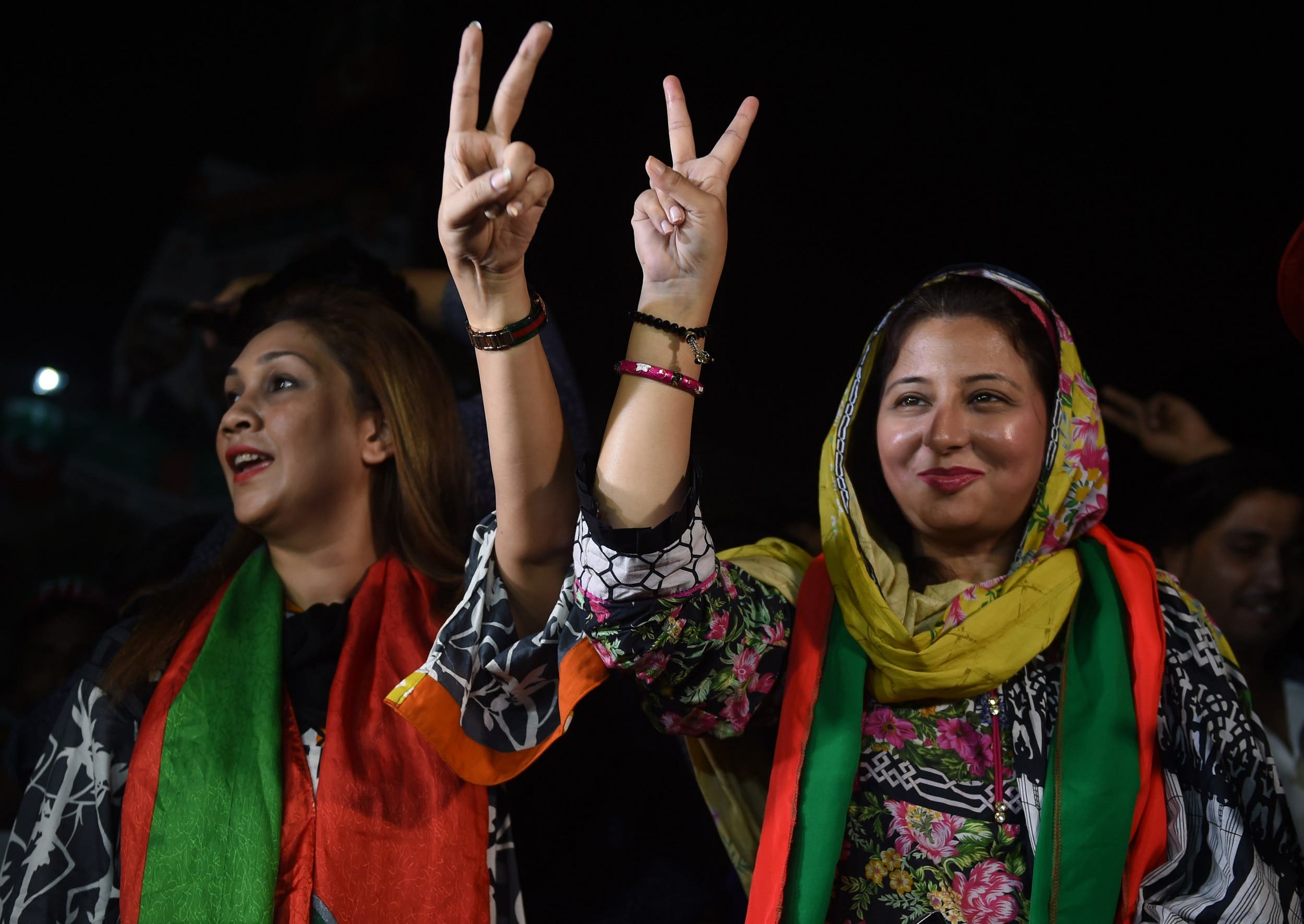Supporters of Imran Khan celebrate in Karachi on July 26, 2018. (AFP)