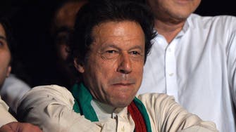 Imran Khan’s party begins coalition talks as rivals plan protests 