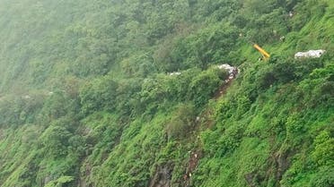 Rescuers work at the site of an accident in Raigad district in the western Indian state of Maharashtra, on Saturday, July 28, 2018. (AP)