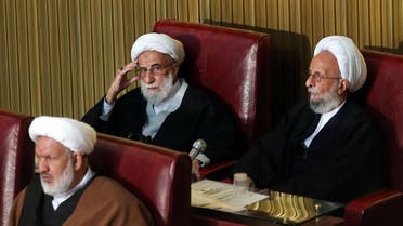 Ayatollah Ahmad Jannati, center, and Mesbah Yazdi, right, attend the fourth assembly in Tehran on March 8, 2016. (AP)