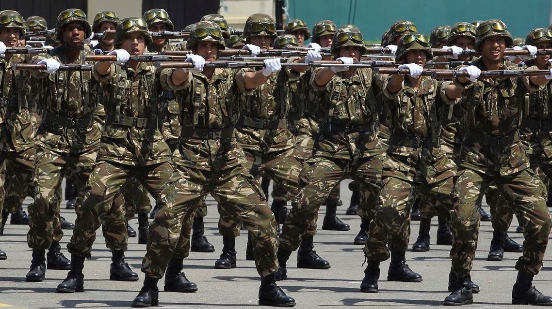 Soldiers march during a military parade at the Cherchell "Houari Boumediene" in Algiers, Sunday, July 1, 2018. (AP)