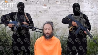 An extremist group has released videos of a Japanese journalist and an Italian man held captive in Syria in which they appeal for their release. (AFP)