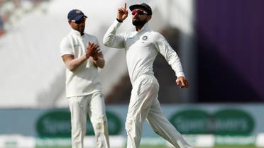 India’s Virat Kohli celebrates after running out England’s Joe Root in Birmingham on day one of the first test on August 1, 2018. (Reuters)