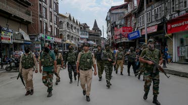 Indian security forces patrol a street in central Srinagar on July 27, 2018. (AP)