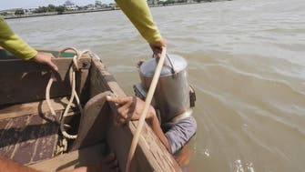 Thai 'Indiana Jones' divers scour murky river for treasure