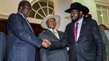 President of South Sudan, Salva Kiir (R) shakes hands with arch-rival South Sudan's opposition leader Riek Machar (L). (AFP)