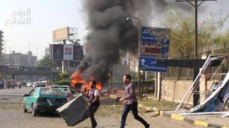 IN PICTURES: Car explodes in Egypt’s Dokki district, causing 13 injuries