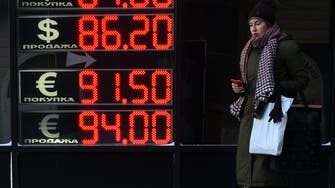 Rouble tumbles to record low as West steps up Russian sanctions