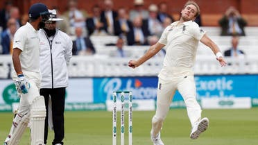England’s Stuart Broad (R) bowls on the fourth day of the second Test cricket match between England and India at Lord’s Cricket Ground in London on August 12, 2018. (AFP)