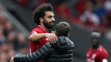 Salah dealt with the incident by hugging the boy and whispering words into his ear amid a clapping audience.(AP)