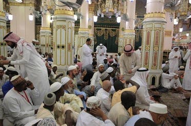 Pictures show some of the employees welcoming Hajj pilgrims by applying musk perfume on their hands, celebrating their arrival to this holy area. (Supplied)