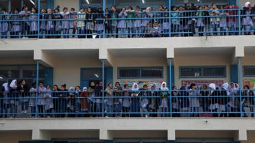 Refugee school girls fly kites during the "Kites of Dignity" event at the UNRWA Rimal Girls Preparatory school in Gaza City, Monday, March 12, 2018.(AP)
