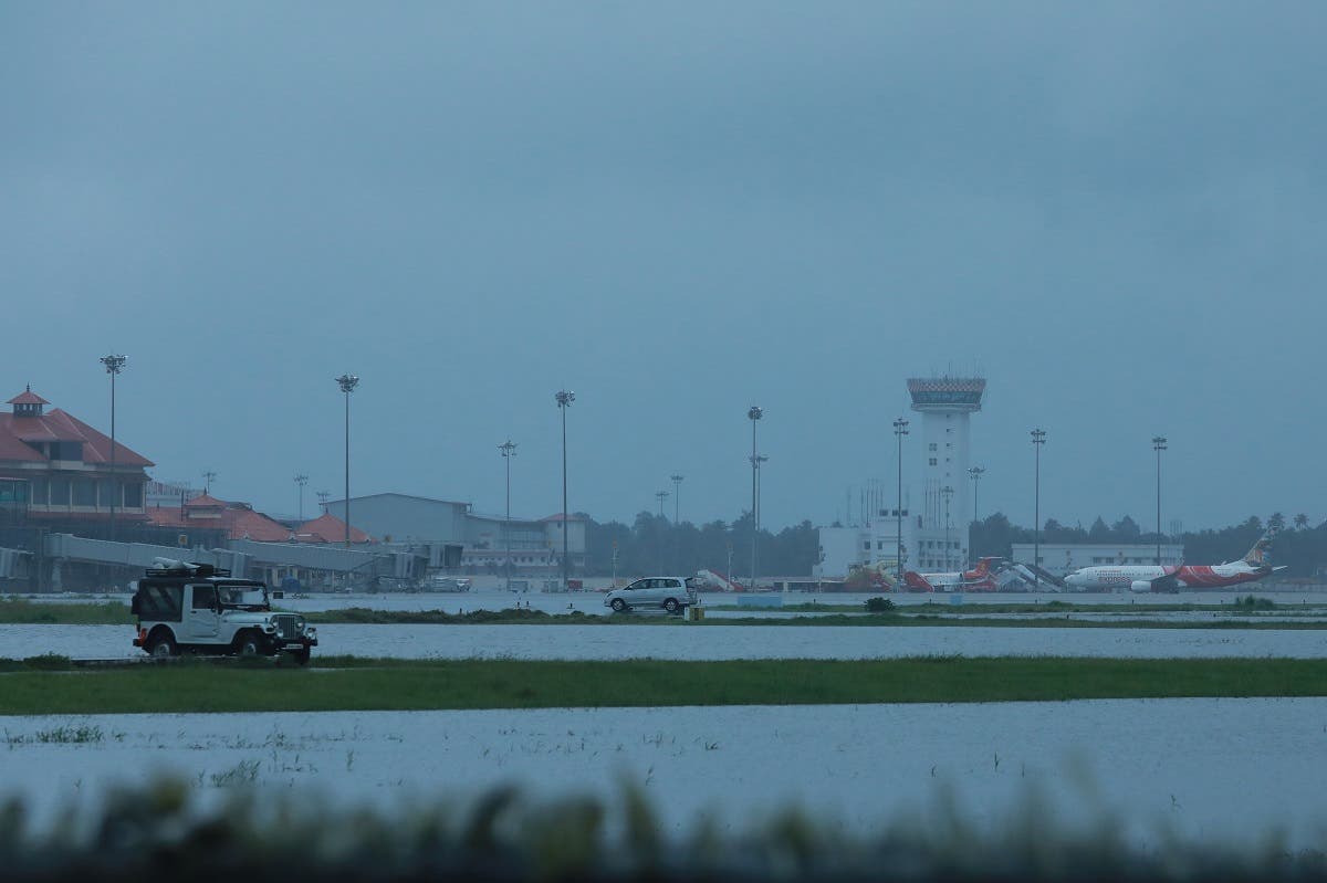Kochi’s International airport apron is seen flooded following monsoon rains in the Indian state of Kerala on August 15, 2018. (AFP)