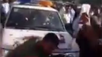 WATCH: Crowd surrounds Iranian policemen who brutally beat street vendor