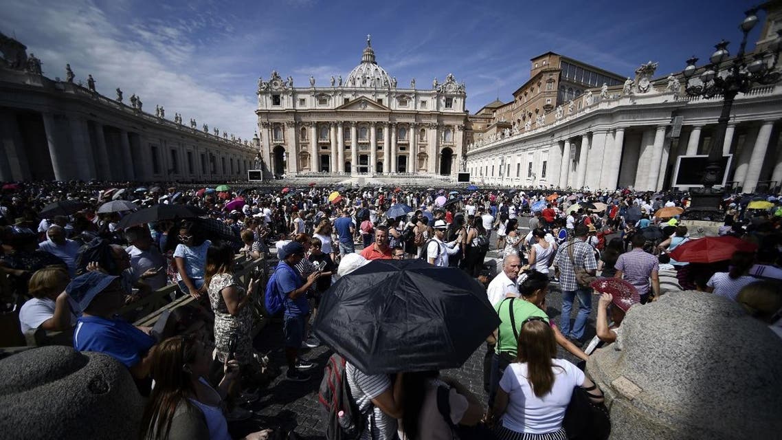 Pilgrims and followers gather to hear Pope Francis ahead of The Angelus Prayer from the window of his studio overlooking St. Peter's Square, The Vatican on August 15, 2018, on The Feast of Assumption.