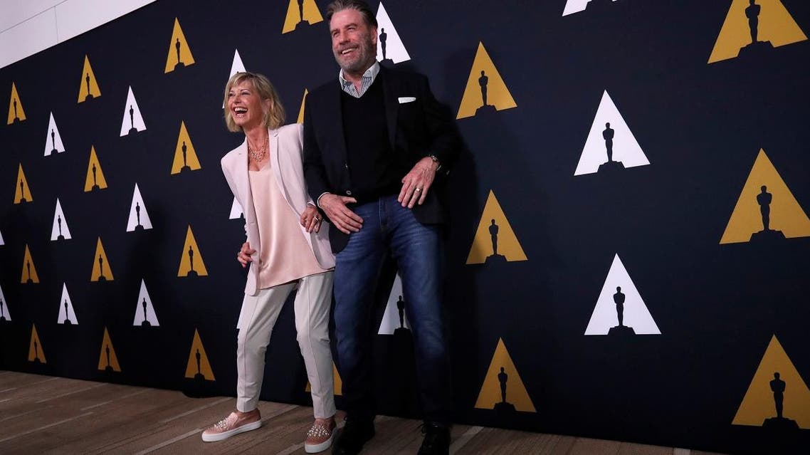 Olivia Newton-John and John Travolta during the 40th anniversary special screening hosted by the American Academy of Film Science and Arts in Beverly Hills on August 15, 2018. (Reuters)