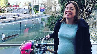 Pregnant New Zealand minister cycles to delivery ward