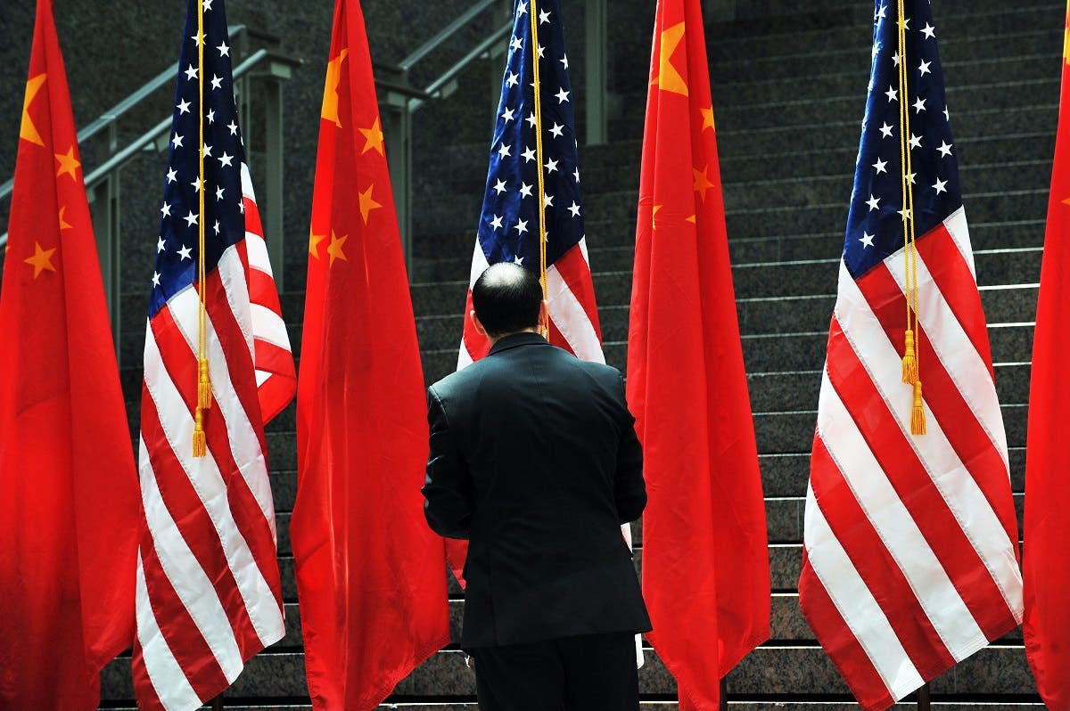 US and Chinese flags (File Photo: AFP)