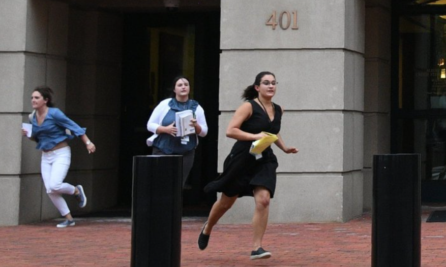 After the end of a trial session for former director of Donald Trump’s presidential campaign, Paul Manafort, journalists rushed out of court running. (Supplied)
