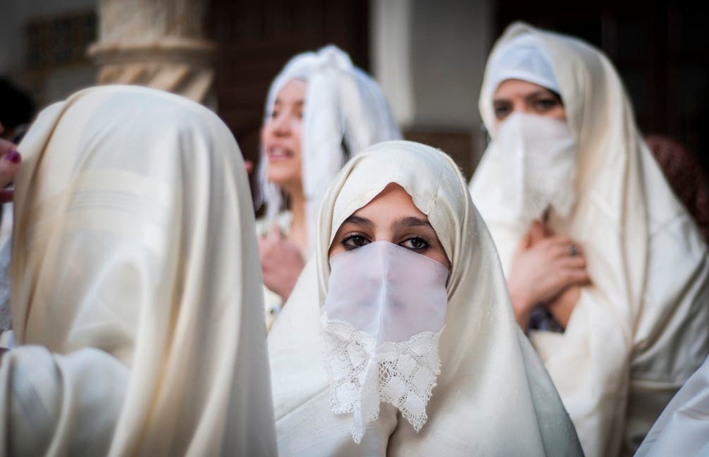 Women of Algeria wore al-Hayek on top of their cloths to cover up their bodies when leaving the house. 