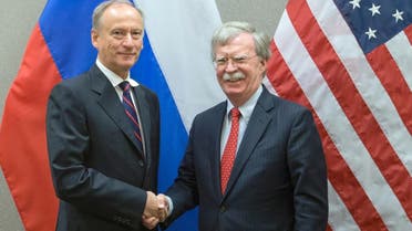 US National Security Advisor John Bolton (R) with his Russian counterpart Nikolai Patrushev during a meeting at the US Mission in Geneva. (AFP)