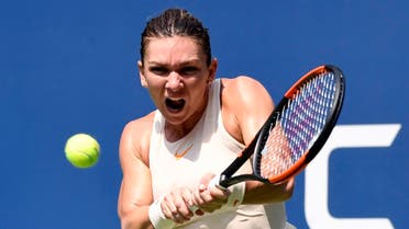 Simona Halep of Romania hits to Kaia Kanepi of Estonia on day one of the 2018 US Open. (Reuters)