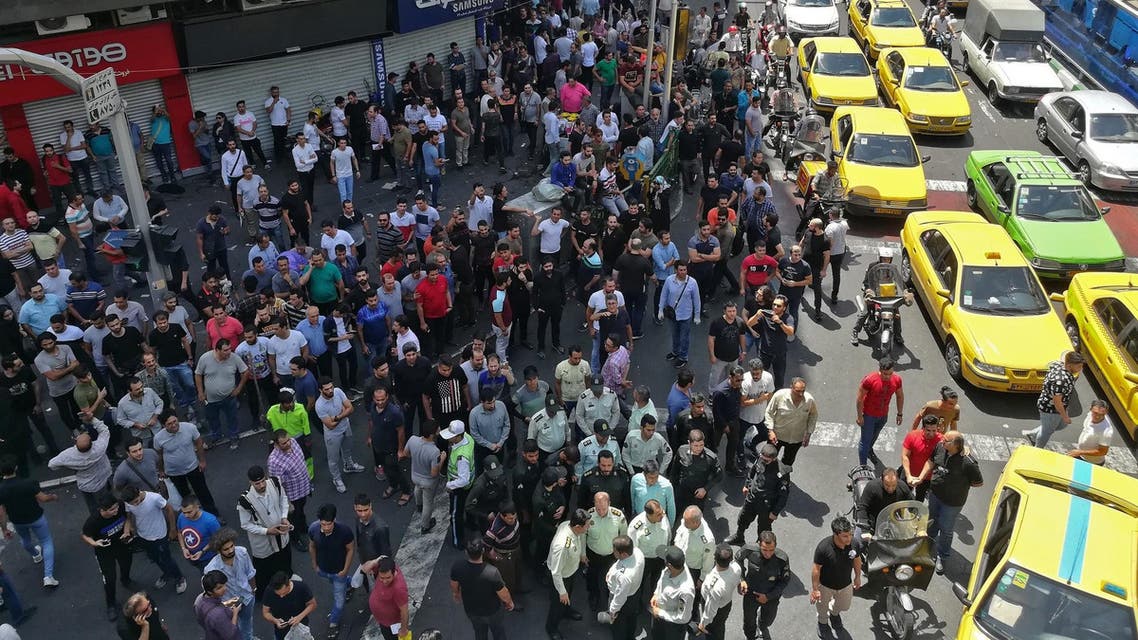 Iranian protesters gather during a demonstration in central Tehran on June 25, 2018. (AFP)