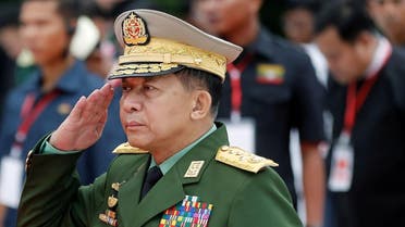 Myanmar's Commander in Chief Senior General Min Aung Hlaing salutes as he attends an event in Yangon. (Reuters)