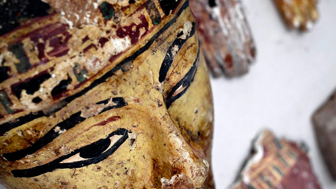 Wood parts from coffins on display at the entrance of the New Kingdom tomb that belongs to a royal goldsmith in a burial shaft during a press conference on site, in Luxor, Egypt, Saturday, Sept. 9, 2017. (AP)