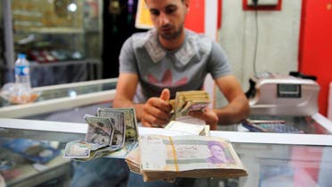 Iranian rials are seen at a currency exchange shop in Baghdad. (Reuters)