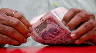 Under-pressure Indian rupee hits record low against dollar
