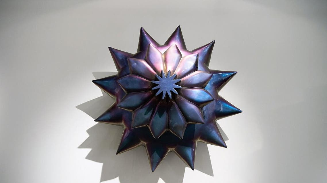 ‘Flower Drill’ by Monira Al Qadiri , 2016. Fiberglass, automotive paint (2 x 2 x 1.2 m each). (Courtesy of the artist)