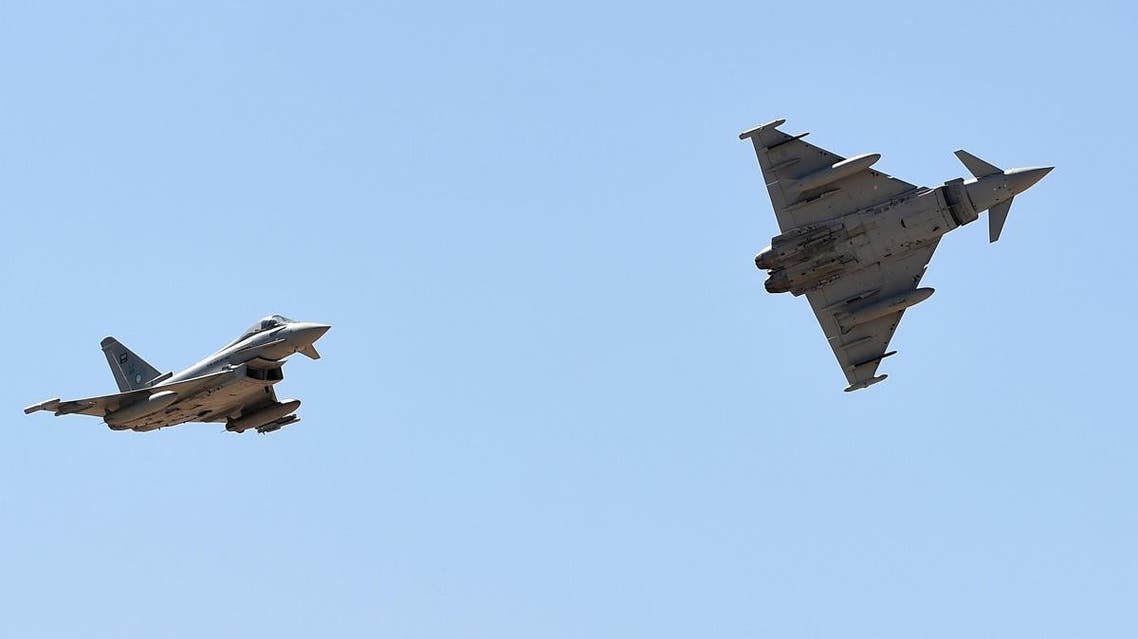 Saudi Air Force Eurofighter Typhoon fighter jets perform during a ceremony marking the 50th anniversary of the creation of the King Faisal Air Academy at King Salman airbase in Riyadh on January 25, 2017. (AFP)