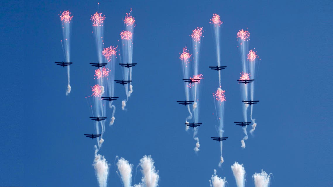 North Korea stages huge parade, holds back on advanced missiles AP