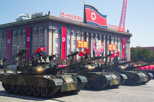 North Korea stages huge parade, holds back on advanced missiles AP