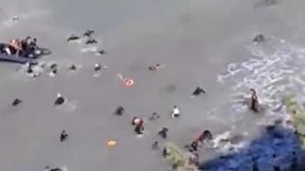 Videos of people floating near Moroccan shore show scale of migrant crisis