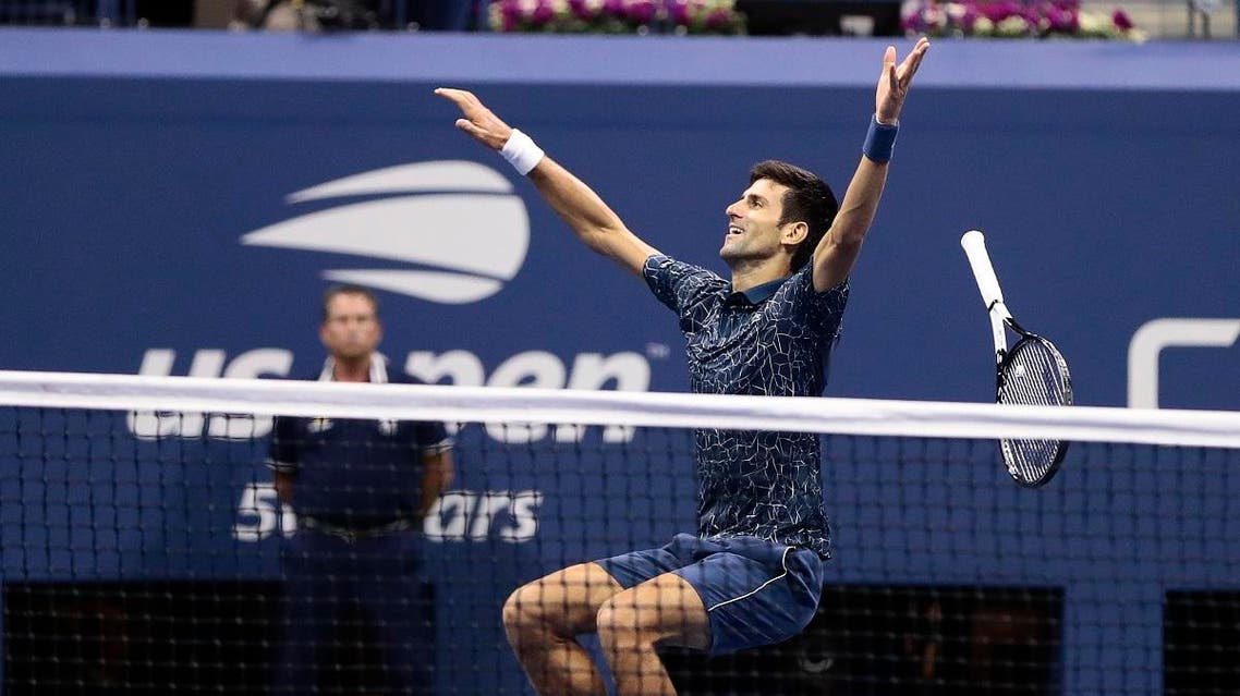 Novak Djokovic celebrates after defeating Juan Martin del Potro. (AP)