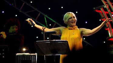 Iranian singer Googoosh, whose real name is Faegheh Atashin, salutes the audience during a rare concert she gave in the Iraqi Kurdish city of Erbil. (AFP)