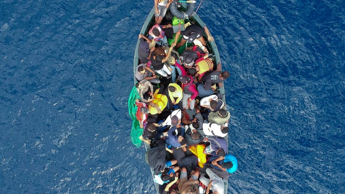 An aerial photo shows a boat carrying migrants stranded in the Strait of Gibraltar before being rescued by the Spanish Guardia Civil and the Salvamento Maritimo sea search and rescue agency that saw 157 migrants rescued on September 8, 2018. While the overall number of migrants reaching Europe by sea is down from a peak in 2015, Spain has seen a steady increase in arrivals this year and has overtaken Italy as the preferred destination for people desperate to reach the continent. Over 33,000 migrants have arrived in Spain by sea and land so far this year, and 329 have died in the attempt, according to the International Organization for Migration.