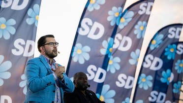 The party leader of the far-right Sweden Democrats, Jimmie Akesson, gives a speech during a campaign meeting in Stockholm on September 8, 2018. (AFP)