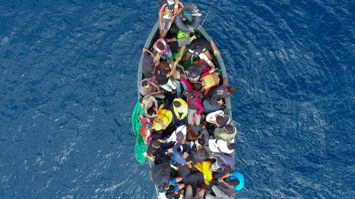 An aerial photo shows a boat carrying migrants stranded in the Strait of Gibraltar before being rescued by the Spanish Guardia Civil and the Salvamento Maritimo sea search and rescue agency that saw 157 migrants rescued on September 8, 2018. While the overall number of migrants reaching Europe by sea is down from a peak in 2015, Spain has seen a steady increase in arrivals this year and has overtaken Italy as the preferred destination for people desperate to reach the continent. Over 33,000 migrants have arrived in Spain by sea and land so far this year, and 329 have died in the attempt, according to the International Organization for Migration.