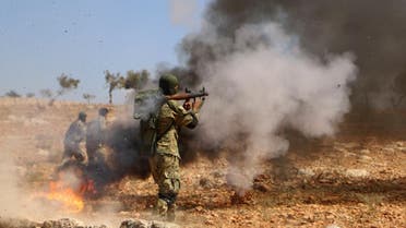 A Syrian rebel fighter from the recently-formed “National Liberation Front” takes part in combat training in the northern countryside of the Idlib province on September 11, 2018. (AFP)