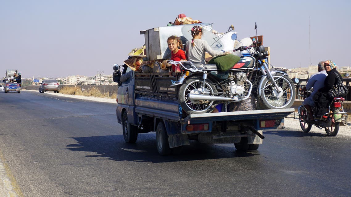 Fleeing Idlib (AFP)