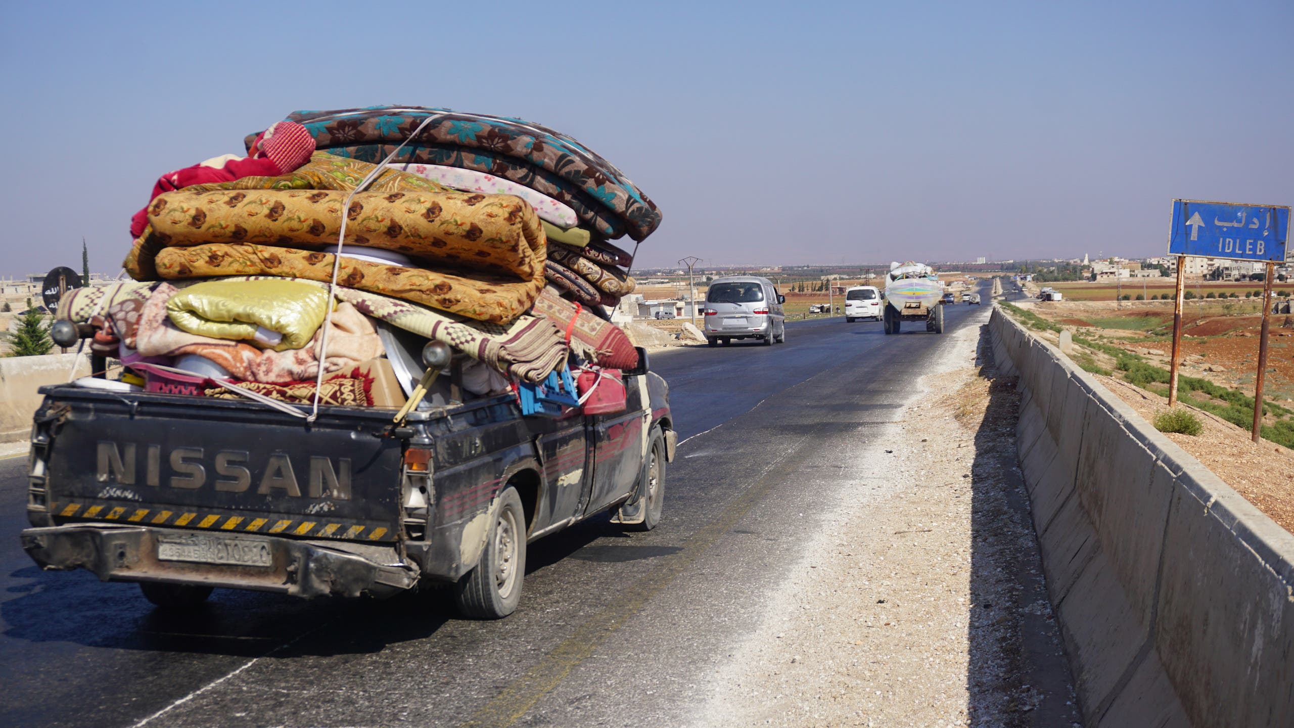 Fleeing Idlib (AFP)