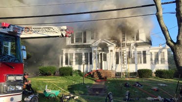 Firefighters battle a house fire, on Thursday, September 13, 2018, on Herrick Road in North Andover, Massachusetts. (AP)