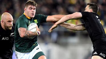 South Africa’s Malcolm Marx runs away from New Zealand’s Owen Franks and Ben Smith in the  Rugby Championship  on September 15, 2018. (Reuters)