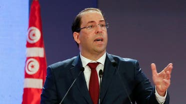 Tunisia's Prime Minister Youssef Chahed speaks during a national conference over 2019 budget in Tunis. (Reuters)