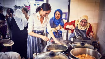 Britain’s Meghan launches Grenfell cookbook
