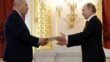 Israeli ambassador to Russia Gary Koren and Vladimir Putin. (AP)